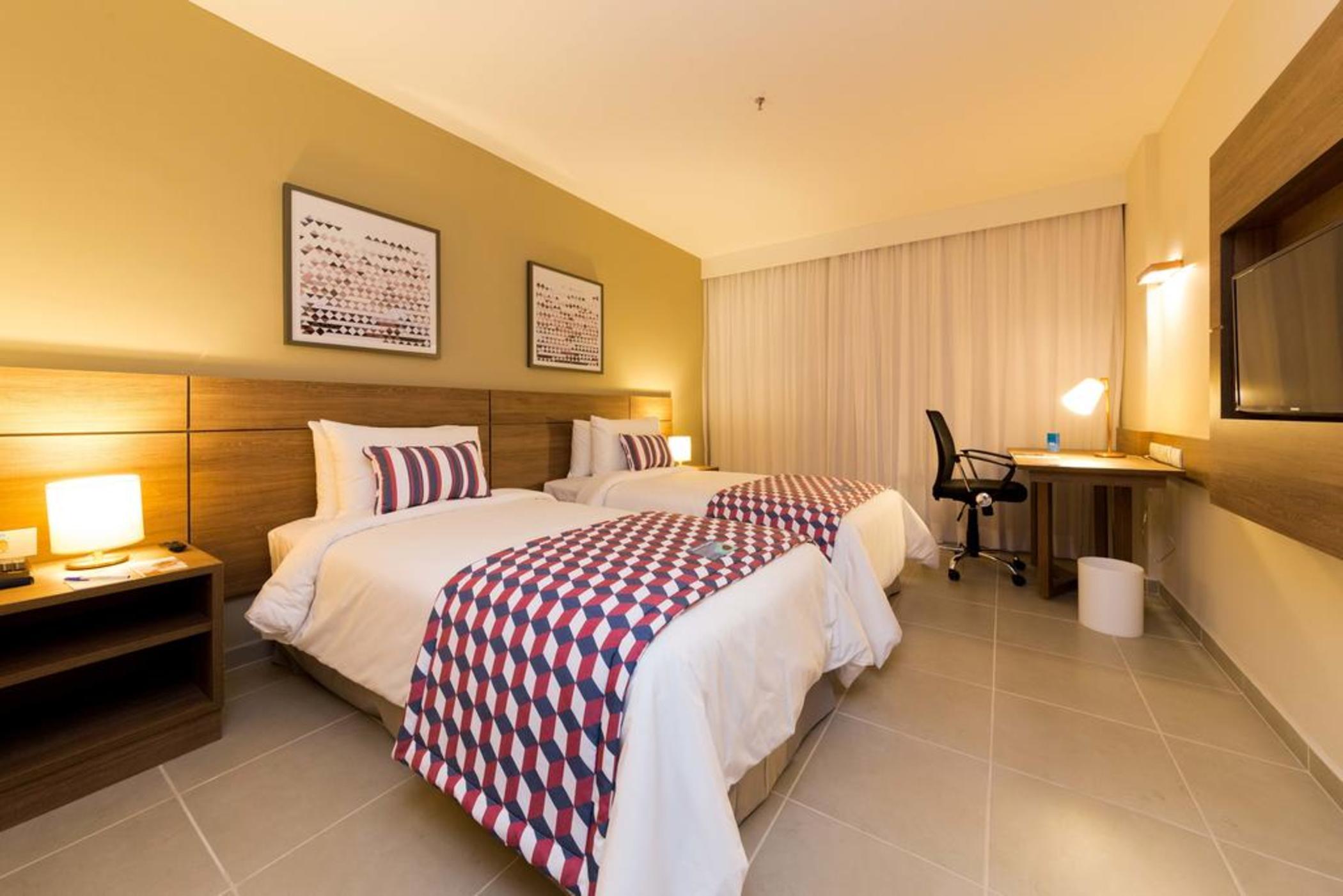 Tulip Inn كامبوس دوس جويتاكازيس المظهر الخارجي الصورة