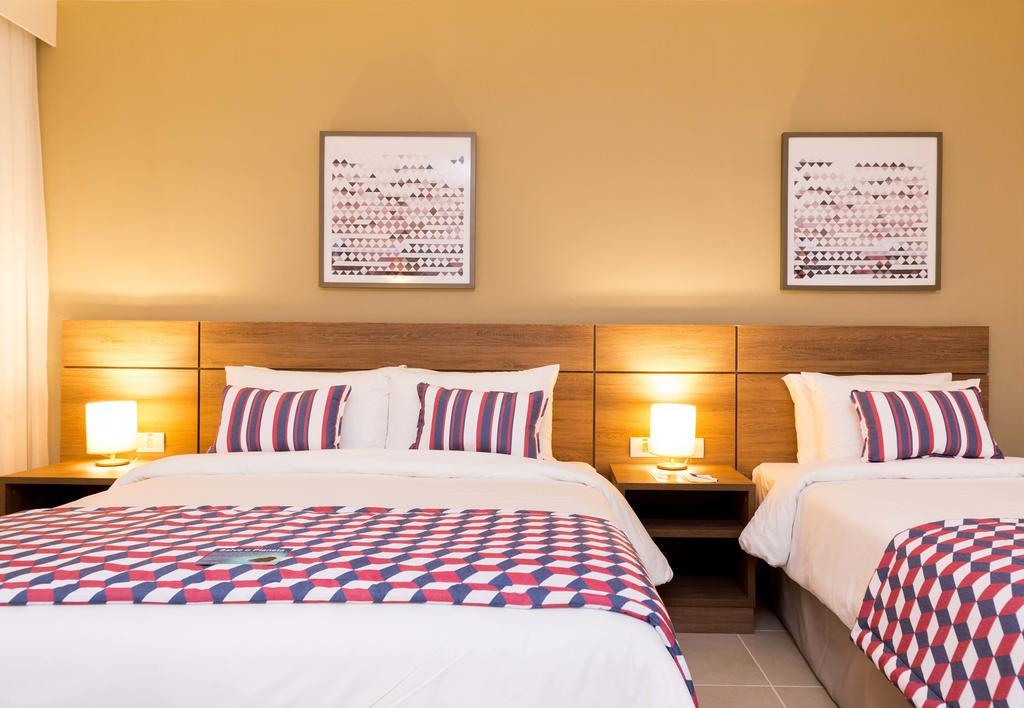 Tulip Inn كامبوس دوس جويتاكازيس الغرفة الصورة