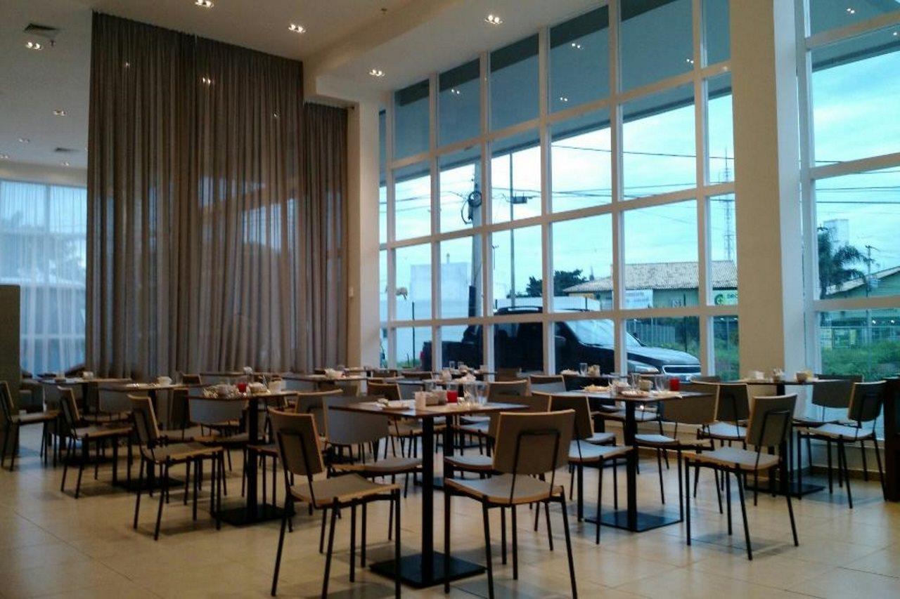 Tulip Inn كامبوس دوس جويتاكازيس المظهر الخارجي الصورة